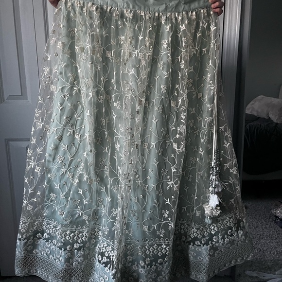 Turquoise Net Embroidered Lehenga Choli - Picture 5 of 9